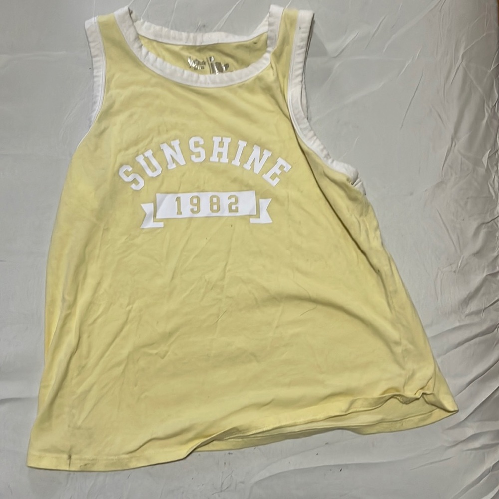 Yellow sleeveless shirt
